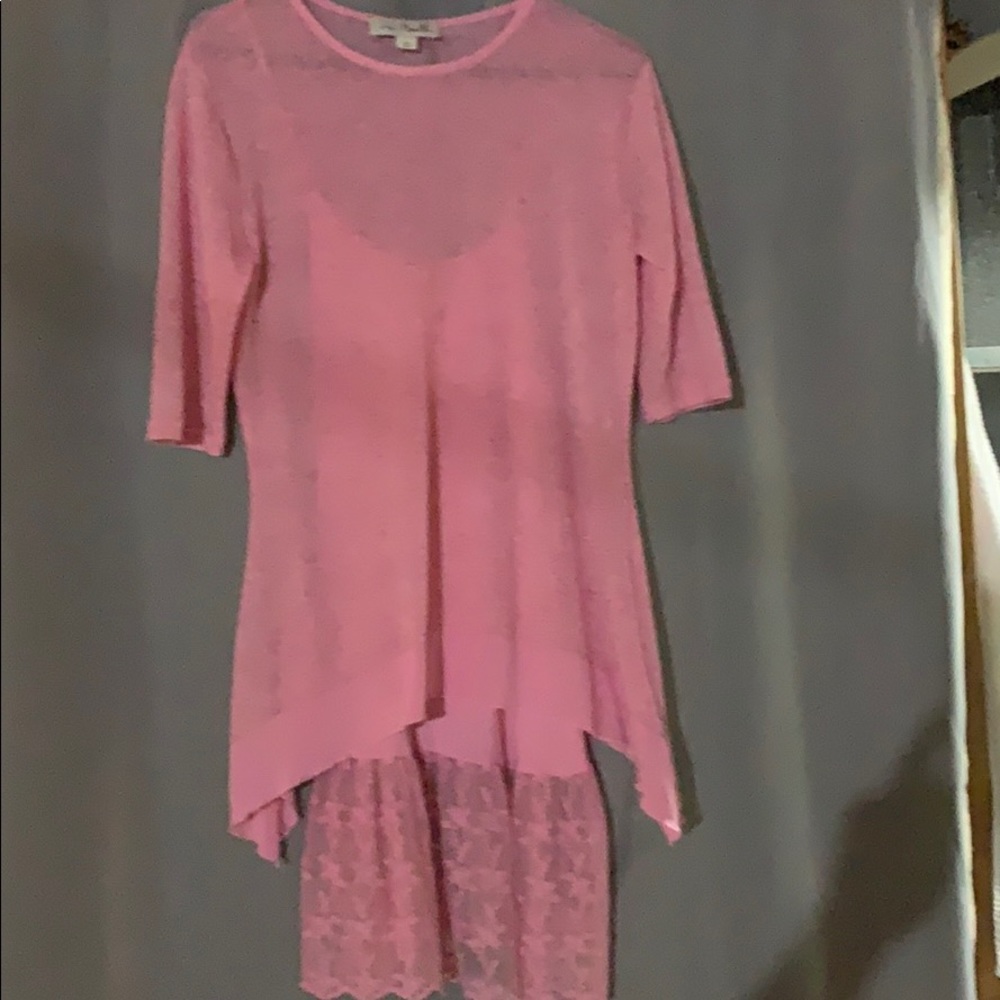 It is a one piece lightweight sweater cami dress